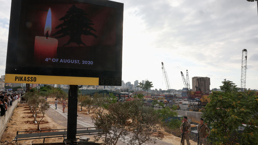 A digital billboard displays a candle and the date "4th of August, 2020" as Lebanon marks the fifth anniversary of the explosion in the port of Beirut, Lebanon August 4, 2025. REUTERS/Mohamed Azakir