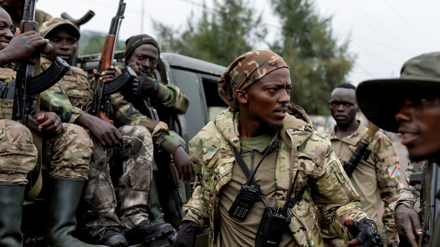 Members of the M23 rebel group gather to supervise Congolese potential recruits for the M23 rebel group before being taken to training centres run by M23 rebels, amid clashes between M23 rebels and the Armed Forces of the Democratic Republic of the Congo (FARDC), in Goma, North Kivu province in eastern Democratic Republic of the Congo, January 30, 2025. REUTERS/Arlette Bashizi/File Photo