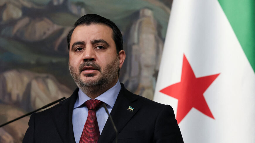 Syrian Foreign Minister Asaad Hassan al-Shibani speaks during a press conference following talks with Russian Foreign Minister Sergei Lavrov in Moscow, Russia, July 31, 2025. REUTERS/Shamil Zhumatov/Pool/File Photo
