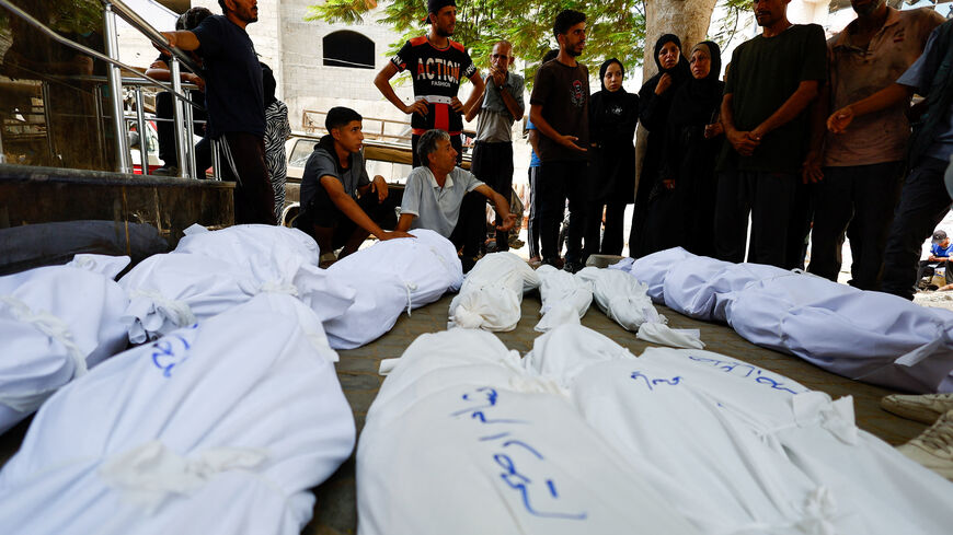 Mourners react during the funeral of Palestinians from Irheem family, who were killed in an overnight Israeli strike, according to medics, in Gaza City August 11, 2025. REUTERS/Mahmoud Issa