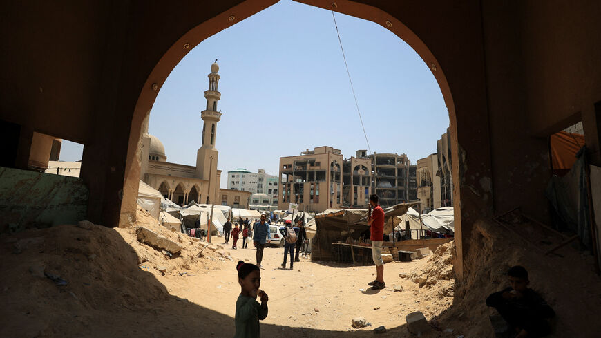 Palestinians, displaced by the Israeli offensive, shelter inside the destroyed Islamic University of Gaza, in Gaza City, June 1, 2025. REUTERS/Dawoud Abu Alkas