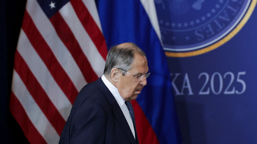 FILE PHOTO: Russian Foreign Minister Sergei Lavrov walks ahead of a joint press conference by U.S. President Donald Trump and Russian President Vladimir Putin, following their meeting to negotiate an end to the war in Ukraine, at Joint Base Elmendorf-Richardson in Anchorage, Alaska, U.S., August 15, 2025. REUTERS/Jeenah Moon/File photo