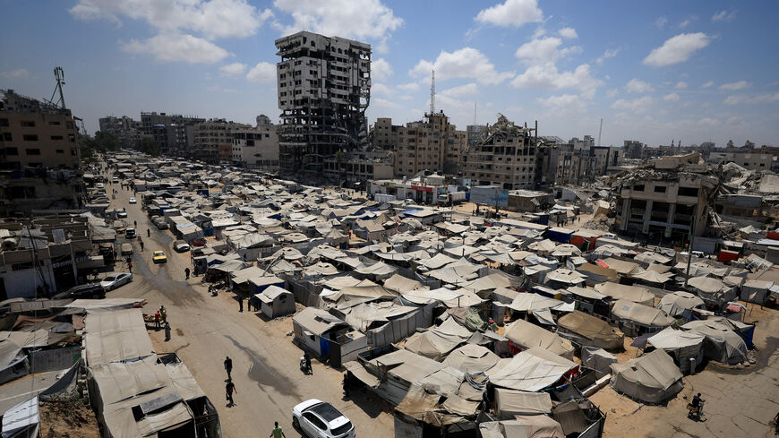 Palestinians, displaced by the Israeli offensive, shelter in a tent camp as the Israeli military prepares to relocate residents to southern Gaza, in Gaza City August 17, 2025. REUTERS/Dawoud Abu Alkas