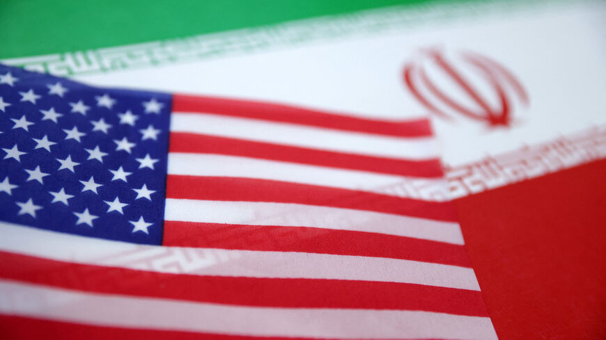 FILE PHOTO: U.S. and Iran flags are seen in this illustration taken June 18, 2025. REUTERS/Dado Ruvic/Illustration/File photo