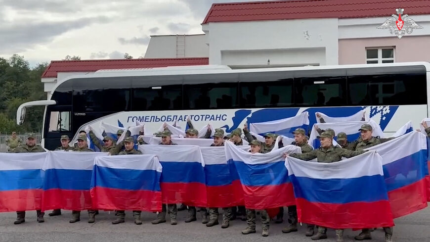 A still image from a video released by the Russian Defence Ministry shows what it said to be Russian service personnel captured by Ukrainian forces and released during the latest exchange of prisoners of war in the course of Russia-Ukraine conflict, at an unknown location in Belarus, in this image taken from footage released August 24, 2025. Russian Defence Ministry/Handout via REUTERS