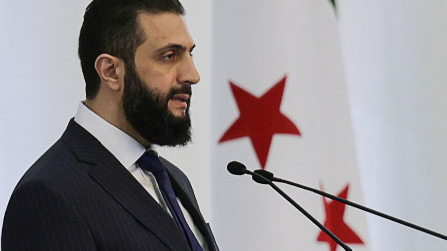 FILE PHOTO: Syria's interim President Ahmed al-Sharaa speaks during a Ministerial formation of the government of the Syrian Arab Republic, in Damascus, Syria, March 29, 2025. REUTERS/Khalil Ashawi/File Photo