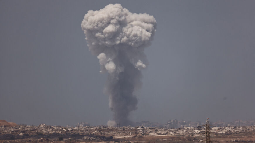 Smoke rises from Gaza after an explosion, as seen from the Israeli side of the border, August 25, 2025. REUTERS/Amir Cohen