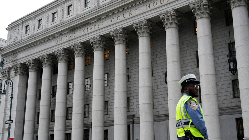 FILE PHOTO: An NYPD officer stands guard before the 2nd U.S. Circuit Court of Appeals in Manhattan, New York, U.S., September 6, 2024. REUTERS/Adam Gray/File Photo