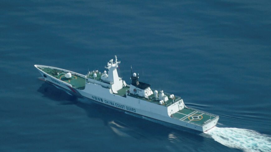 FILE PHOTO: An aerial view of a China Coast Guard ship navigating near the disputed Scarborough Shoal in the South China Sea, August 13, 2025. REUTERS/Adrian Portugal/File Photo