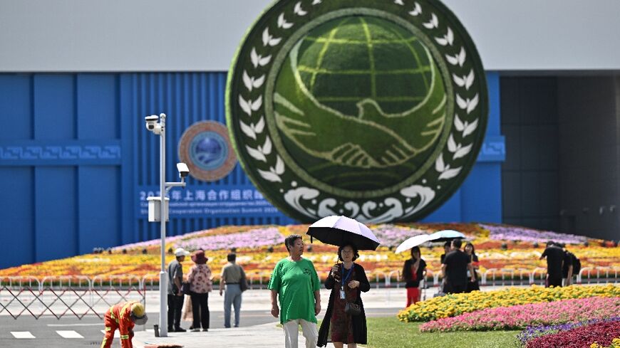 Chinese President Xi Jinping began welcoming leaders from 26 countries before the Shanghai Cooperation Organisation summit in the northern city of Tianjin