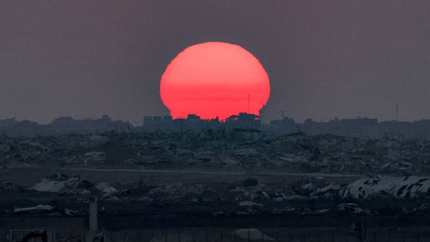 The sun sets over the Gaza Strip on August 10, 2025