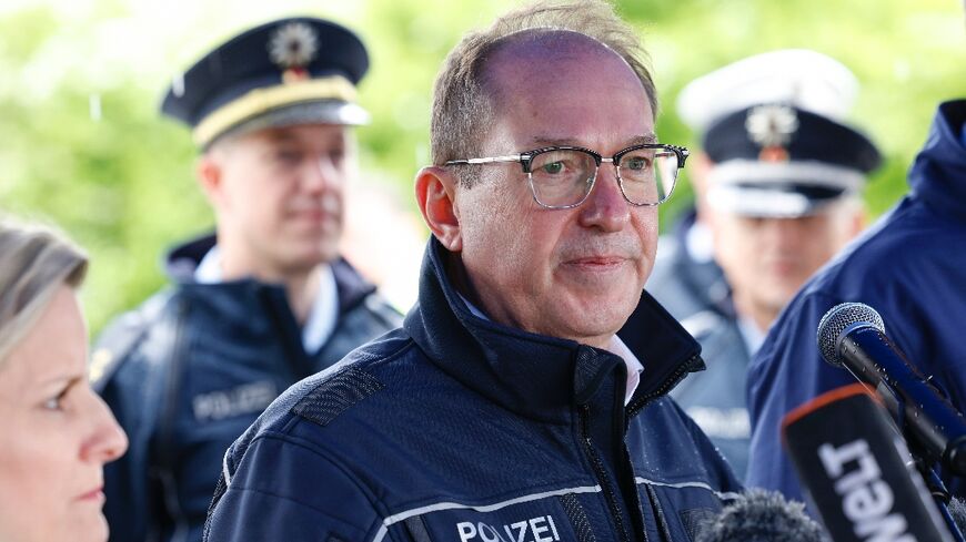 German Interior Minister Alexander Dobrindt during a visit to a border control station in Kiefersfelden, southern Germany, on May 15, 2025 