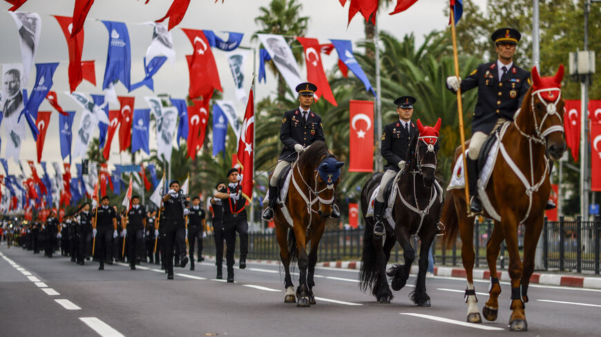 Turkish soldiers march, including some on horses, during a military parade marking the 102nd anniversary of the Victory Day at Vatan Street in Istanbul on Aug. 30, 2024. 