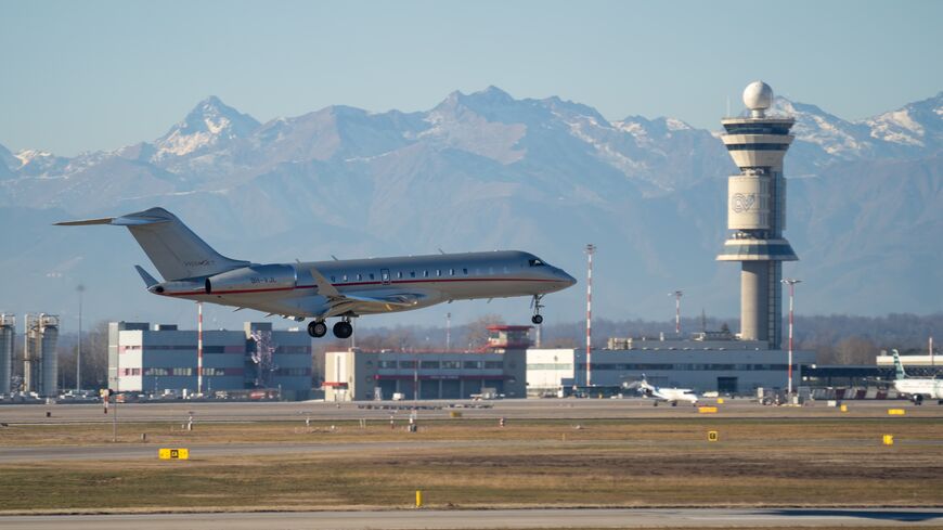 VistaJet Bombardier Bombardier Global 6000 is landing at Milano Malpensa international airport.