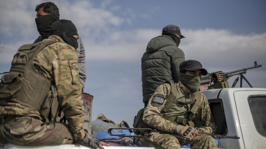 Members of the new Syrian government's army are seen amid battles with militias loyal to the Assad regime on the Syrian coast near Latakia, Syria, on March 7, 2025. 
