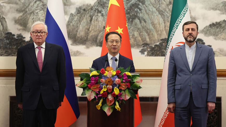 Russian Deputy Foreign Minister Sergei Ryabkov, China's Executive Vice Minister of Foreign Affairs Ma Zhaoxu, and Iran's Deputy Foreign Minister Kazem Gharibabadi hold a press conference at the Diaoyutai State Guesthouse in Beijing on March 14, 2025. (LINTAO ZHANG/POOL/AFP via Getty Images)