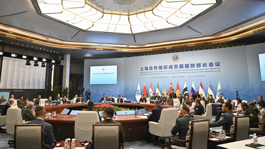 Delegates attend the Defense Ministers' Meeting of the Shanghai Cooperation Organization member states in Qingdao, in eastern China's Shandong province on June 26, 2025.