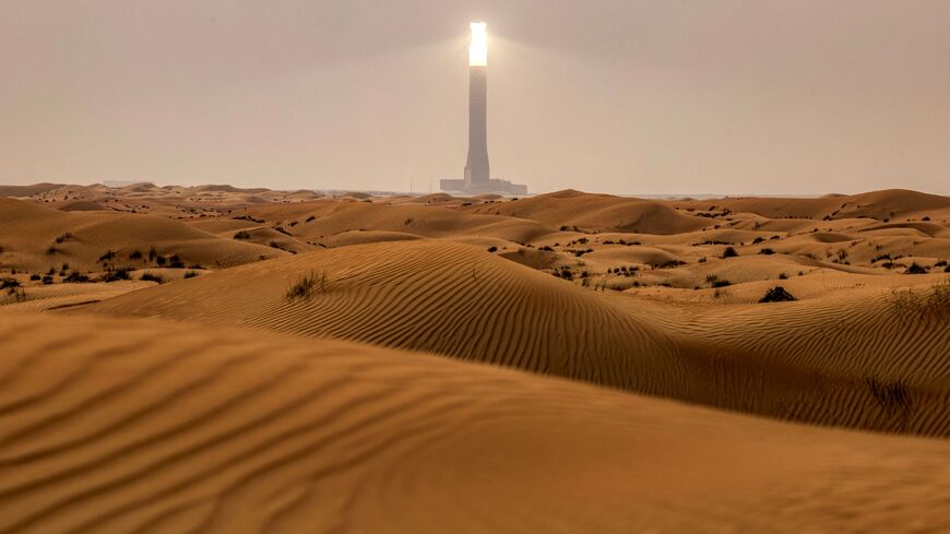 The tallest solar power tower in the world at 260 metres is pictured at the concentrated solar thermal power (CST) Noor Energy 1 solar complex at Mohammed bin Rashid al-Maktoum Solar Park, about 50 kilometres south of Dubai, on July 19, 2025. (Photo by FADEL SENNA / AFP) (Photo by FADEL SENNA/AFP via Getty Images)