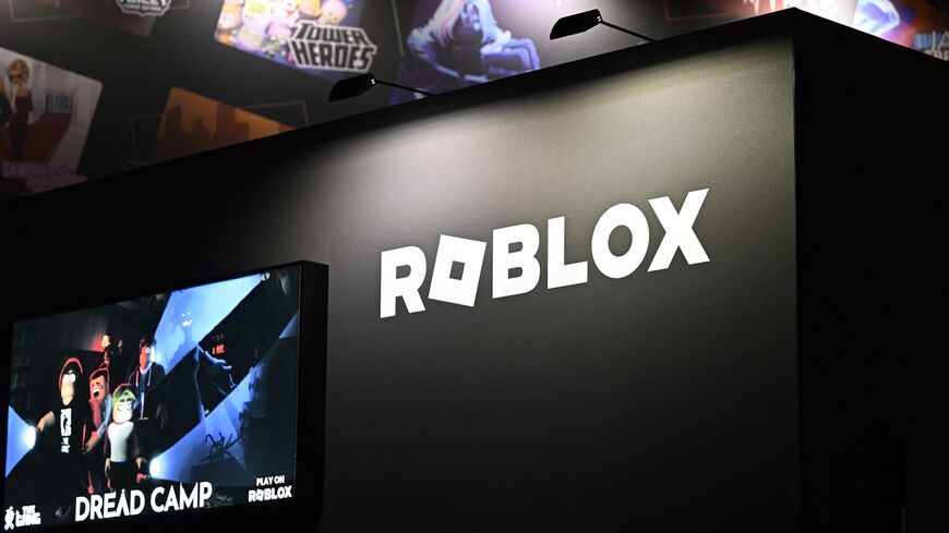 The logo of the online game platform and game creation system Roblox at a booth during Gamescom, a video games trade fair, Cologne, Germany, Aug. 21, 2025.