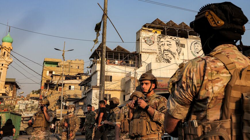 Lebanese army soldiers are stationed at the Burj al-Barajneh camp for Palestinian refugees in Beirut's southern suburbs on Aug. 21, 2025, as armed Palestinian groups in the refugee camps start handing over their weapons.