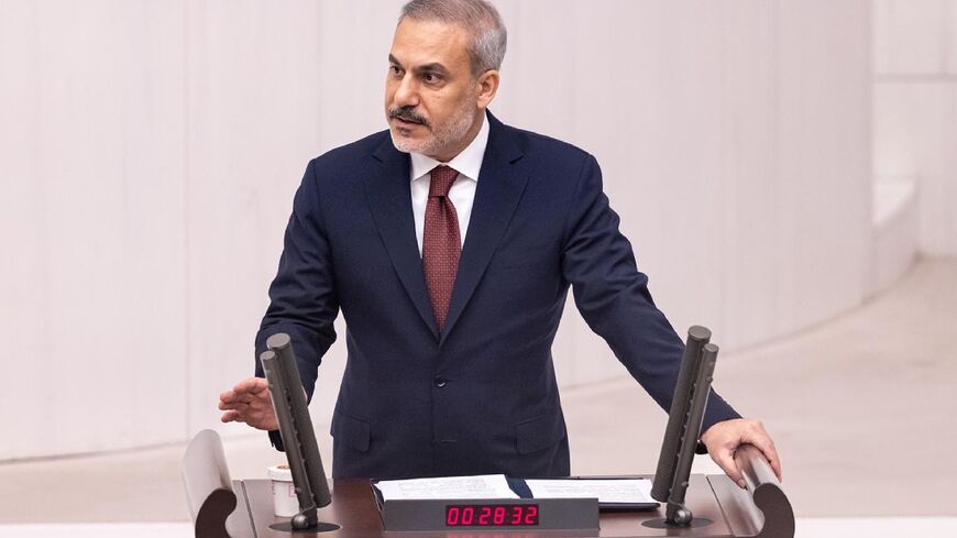 Turkish Foreign Minister Hakan Fidan addresses parliament during a special session on Gaza 