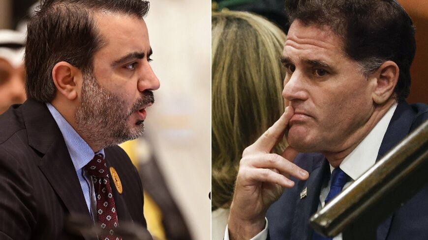 Syrian Foreign Minister Asaad al-Shibani (L) attended a diplomatic meeting in Paris with  Israel's Strategic Affairs Minister Ron Dermer to discuss de-escalation of violence in Syria