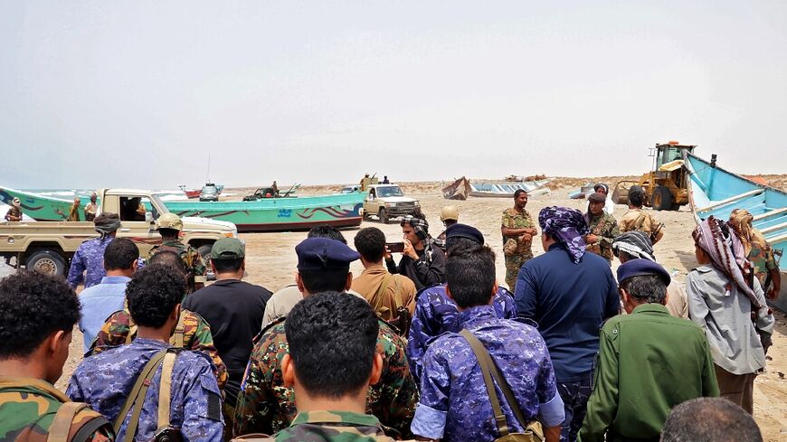 Security forces in Yemen's Abyan province conduct a sweep on the coast searching for bodies and survivors after a migrant shipwreck