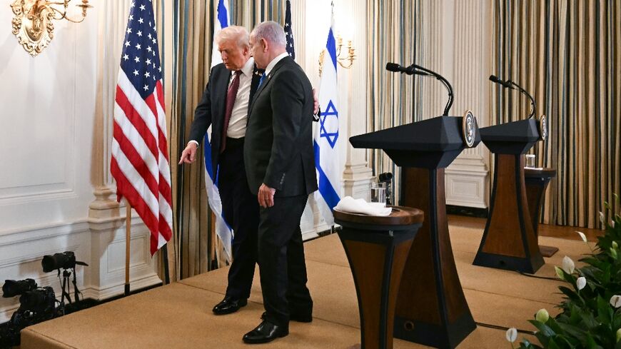 US President Donald Trump and Israeli Prime Minister Benjamin Netanyahu depart at the conclusion of a joint press conference at the White House