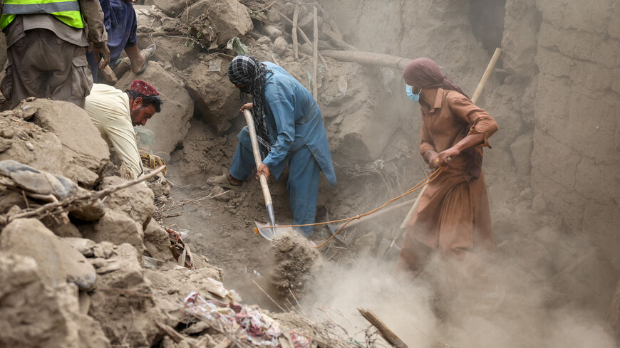 Rescue workers search for victims amidst debris of a damaged house after a deadly magnitude-6 earthquake that struck Afghanistan on Sunday, in Mazar Dara, Kunar province,  Afghanistan, September 2, 2025. REUTERS/Sayed Hassib