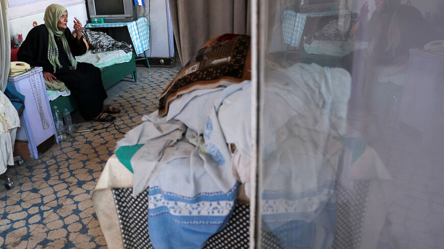 Khaddara Ibrahim Ali, 84, gestures during an interview with Reuters inside her house, as Egypt’s rent law reform threatens to upend the lives of millions, ending decades of housing stability amid rising economic pressures, in downtown Cairo, Egypt August 25, 2025. REUTERS/Amr Abdallah Dalsh