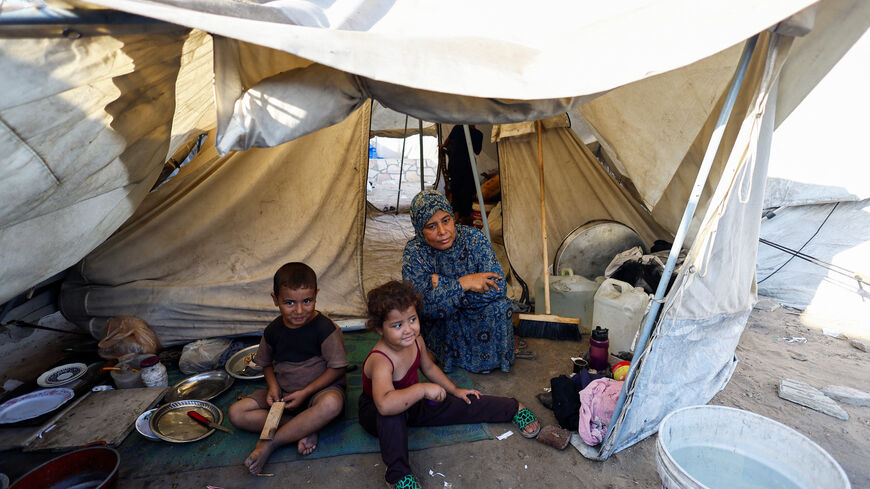 Palestinians displaced by the Israeli military offensive take shelter in a tent camp, as Israeli forces escalate operations around Gaza City, in Gaza City, September 3, 2025. REUTERS/Mahmoud Issa