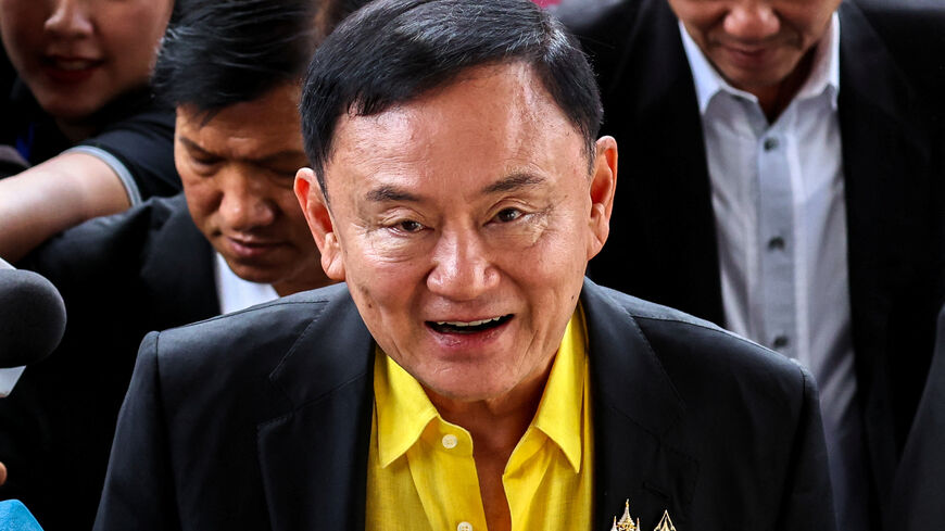 Former Thailand Prime Minister Thaksin Shinawatra arrives at the Criminal court for a lese majeste case, also known as a royal insult case in Bangkok, Thailand, August 19, 2024. REUTERS/Athit Perawongmetha/File Photo