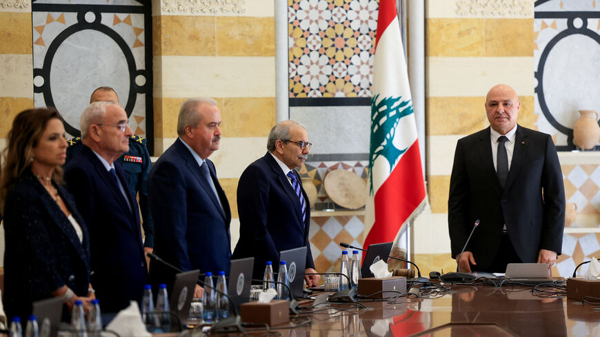 Lebanese President Joseph Aoun, Prime Minister Nawaf Salam and members of the cabinet stand as they attend a cabinet session to discuss the army's plan to disarm Hezbollah, at the Presidential Palace in Baabda, Lebanon, September 5, 2025. REUTERS/Mohamed Azakir