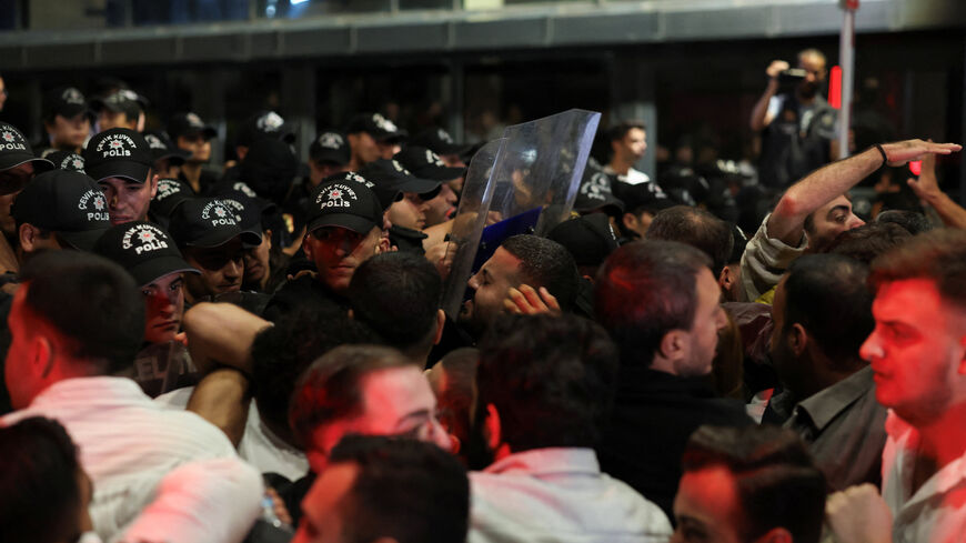 Police officers stop supporters of Turkey’s main opposition Republican People’s Party (CHP) from reaching the Istanbul provincial office, after a recent court ruling that ousted the CHP's Istanbul provincial leadership, in Istanbul, Turkey, September 7, 2025. REUTERS/Umit Bektas