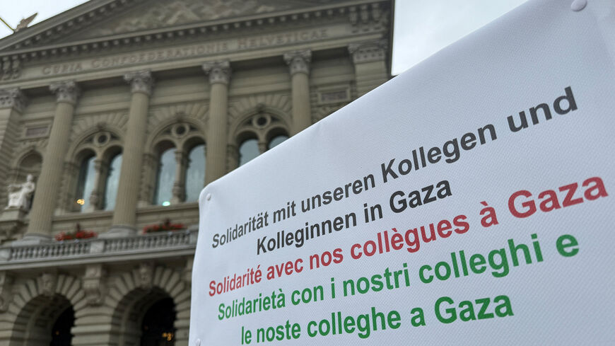 A sign of solidarity with their colleagues in Gaza, from Swiss doctors Michele Ghielmini, Brenno Balestra, Alessandra Guaita and Marco Franzi, is seen outside the Swiss Parliament building (Bundeshaus) at the start of their hunger strike over Gaza, calling on their government to apply targeted sanctions on Israel over its alleged violations of international law and to recognise a Palestinian state, in Bern, Switzerland, September 8, 2025.  REUTERS/Cecile Mantovani