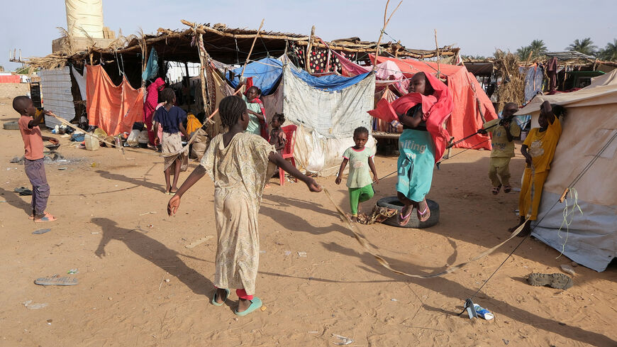 Displaced Sudanese girls, who fled intense fighting in al-Fashir, play at a displacement camp, as the humanitarian situation deteriorates amid the ongoing conflict between the paramilitary Rapid Support Forces (RSF) and the Sudanese army, in Al Dabba, Sudan, September 6, 2025. REUTERS/El Tayeb Siddig