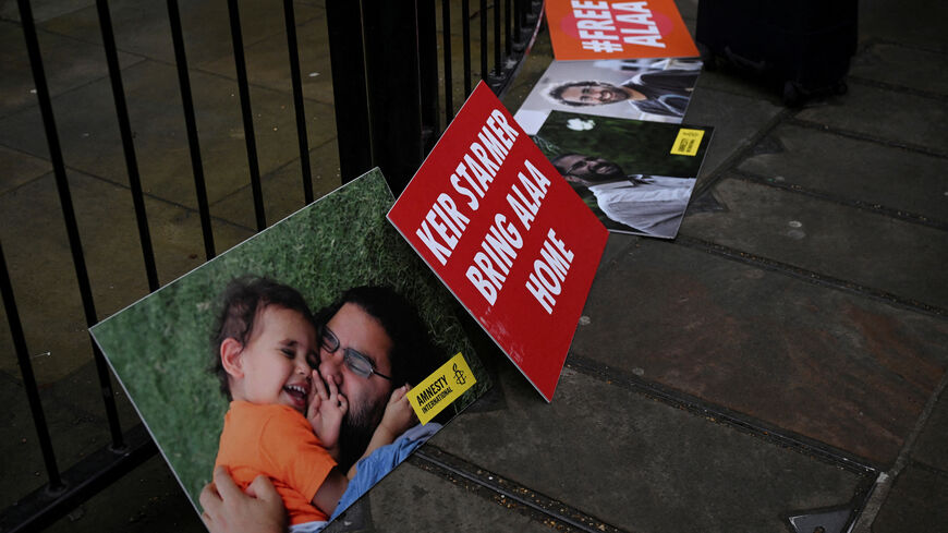 FILE PHOTO: Signage to support Egyptian-British activist Alaa Abd el-Fattah is displayed during the hunger strike of Laila Soueif to protest against her son's detention in Egypt, outside Downing Street in Westminster in London, Britain, February 10, 2025.  REUTERS/Jaimi Joy/File Photo