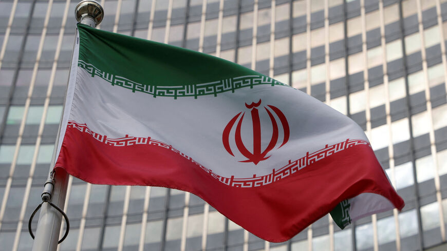 FILE PHOTO: The Iranian flag flutters in front of the International Atomic Energy Agency (IAEA) organisation's headquarters in Vienna, Austria, June 5, 2023. REUTERS/Leonhard Foeger/ File Photo