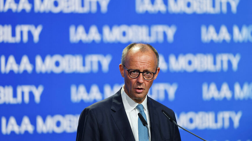 German Chancellor Friedrich Merz makes closing remarks after touring the IAA Mobility 2025 auto show in Munich, Germany, September 9, 2025. REUTERS/Kai Pfaffenbach