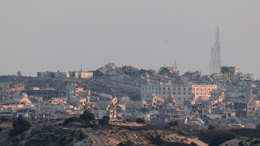 FILE PHOTO: Building lie in ruin in Gaza, as seen from the Israeli side of the border with Gaza, September 9, 2025. REUTERS/Amir Cohen/File Photo