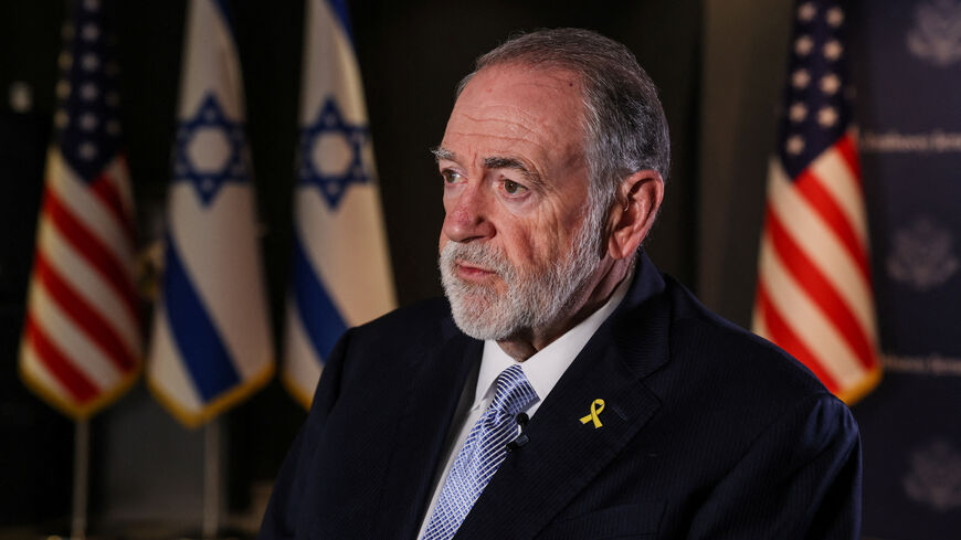 U.S. Ambassador to Israel Mike Huckabee looks on during an interview with Reuters in Jerusalem, September 10, 2025. REUTERS/Ronen Zvulun