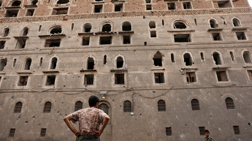 A museum official stands outside the damaged National Museum of Yemen building in the aftermath of Israeli airstrikes, in Sanaa, Yemen, September 11, 2025. REUTERS/Khaled Abdullah