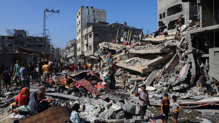 Palestinians inspect the site of Israeli air strikes on houses, at al-Shati (Beach) refugee camp, in Gaza City, September 12, 2025. REUTERS/Ebrahim Hajjaj