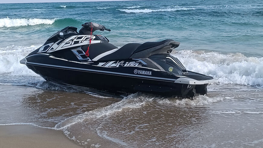 A jet ski is beached before Muhammad Abu Dakha, a 31-year-old Palestinian from Gaza, and two other Palestinian migrants use it to sail to Lampedusa, Italy, to seek asylum, on a beach near Khums, Libya August 17, 2025. Muhammad Abu Dakha/Handout via REUTERS
