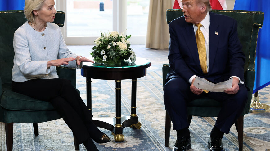 FILE PHOTO: European Commission President Ursula von der Leyen speaks with U.S. President Donald Trump, after the announcement of a trade deal between the U.S. and EU, in Turnberry, Scotland, Britain, July 27, 2025. REUTERS/Evelyn Hockstein/ File Photo