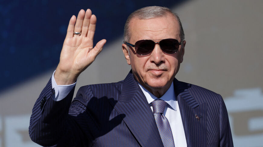 FILE PHOTO: Turkish President Tayyip Erdogan greets the audience during the Teknofest Blue Homeland event at the Naval Shipyard Command in Istanbul, Turkey, August 28, 2025. Teknofest, the country's largest aerospace and technology festival, is expanding this year to showcase Turkey's naval capabilities and advanced technologies in a special maritime-themed edition. REUTERS/Murad Sezer/File Photo