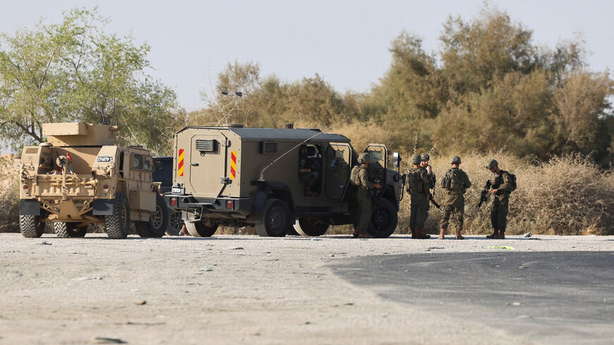 FILE PHOTO: Members of the Israeli military gather at the scene of a fatal shooting at the Allenby Crossing between the Israeli-Occupied West Bank and Jordan, September 18, 2025. REUTERS/Oren Ben Hakoon/File photo