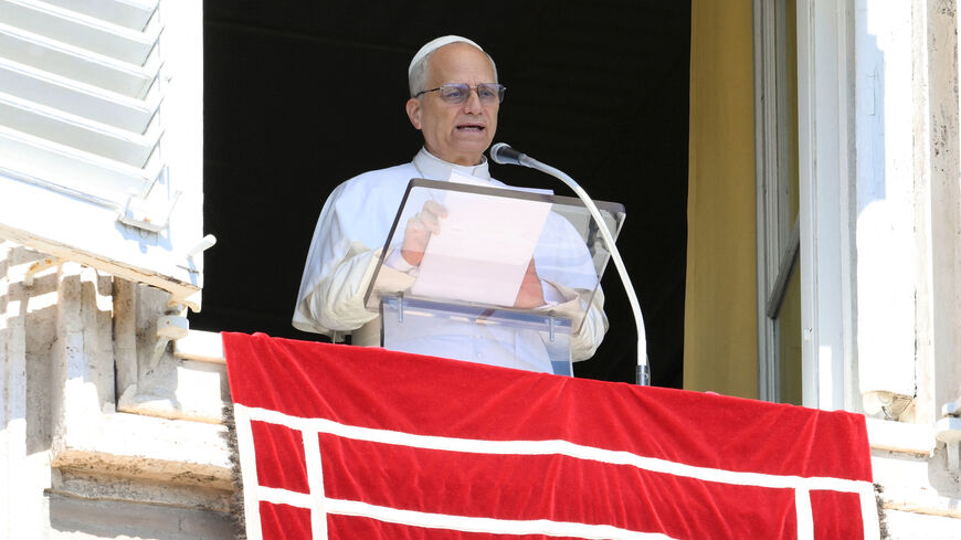 Pope Leo XIV speaks as he appears to lead the weekly Angelus prayer, at the Vatican, September 21, 2025.   Vatican Media/Mario Tomassetti/Handout via REUTERS