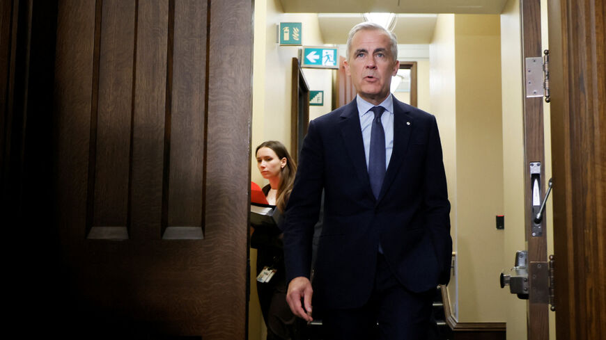 Canada's Prime Minister Mark Carney walks to the House of Commons for Question Period on Parliament Hill in Ottawa, Ontario, Canada September 15, 2025. REUTERS/Blair Gable