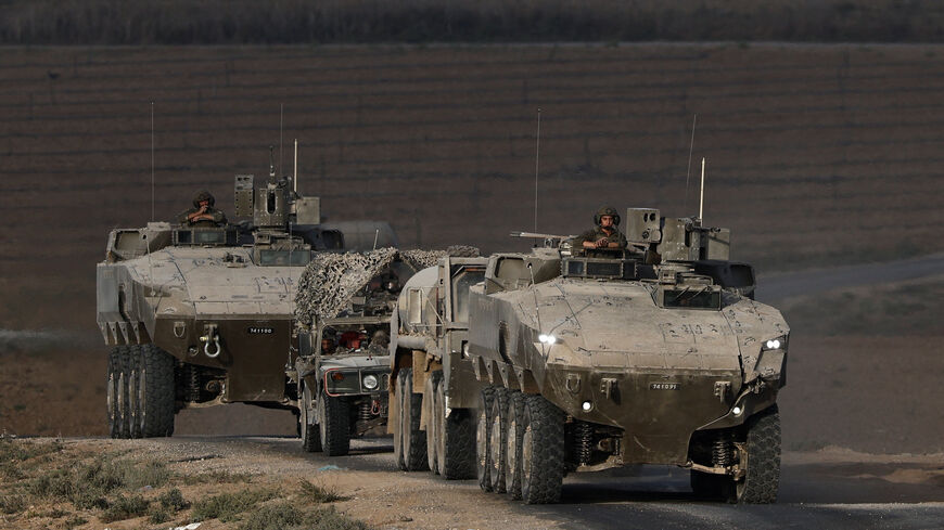 An Israeli military convoy manoeuvres on Israeli side of the Israel-Gaza border, in Israel, September 21, 2025. REUTERS/Amir Cohen/File Photo